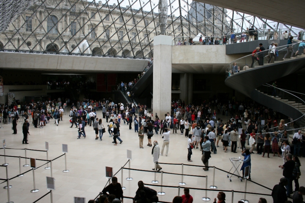 Crowd inside Louvre Paris France